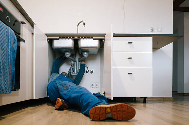 Professional Drain Cleaning technician working in Tahlequah, OK